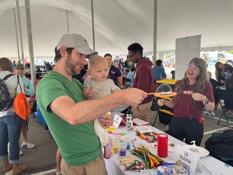 Parent and kid enjoy STEM Day